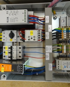 Control cabinet liquid silo